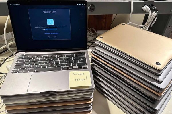 A stack of Activation Locked macbooks